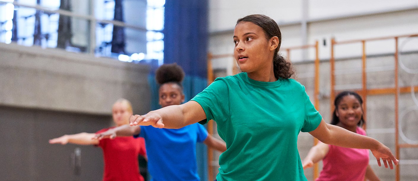 A teenage practising Tai Chi